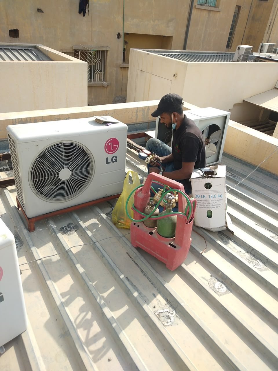 Refrigerator Gas Charging & Servicing field photo